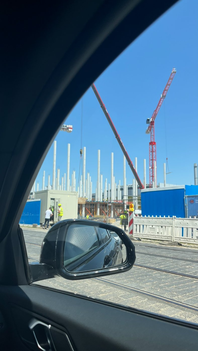 Two sites. Winthrop in Dietzenbach at dusk, the evening before; precast columns going up on a second site in Frankfurt the next morning, seen from the car.